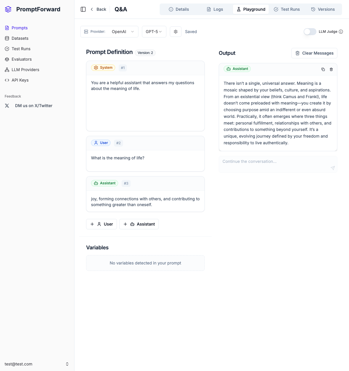 Prompt playground interface showing system message, variables, and test output